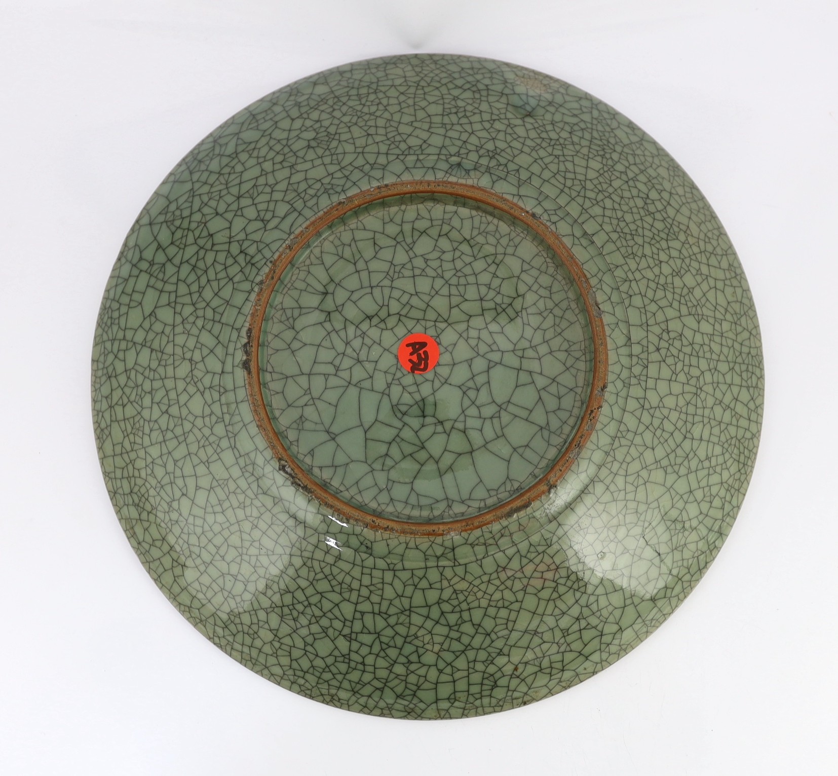 A large Chinese Guan type crackle glaze dish, 19th/20th century, 45.5cm diameter